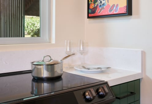 Royal Lahaina hotel suite private living room, Bungalow Studio Suite Oceanfront with bar table and four bar stools.