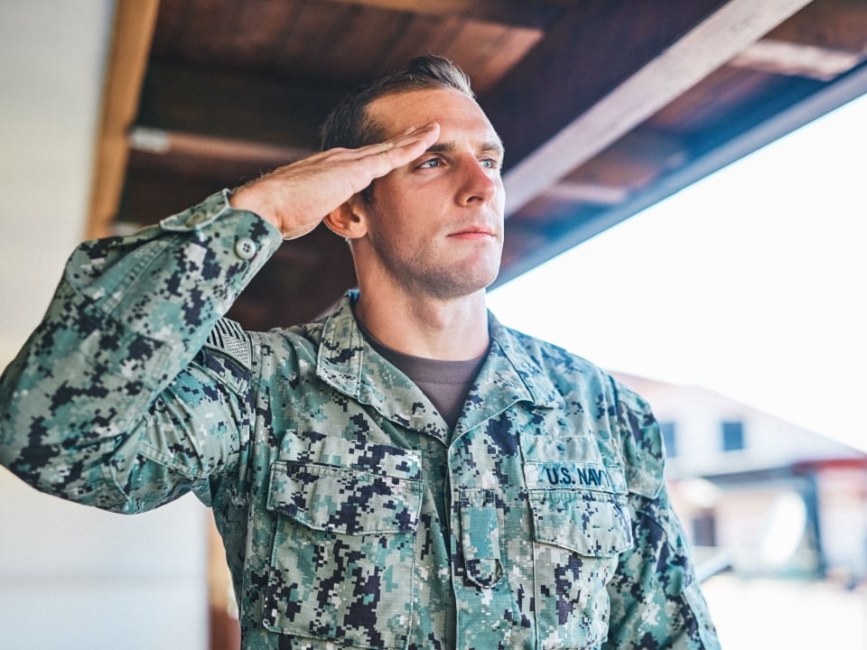 A man who salutes