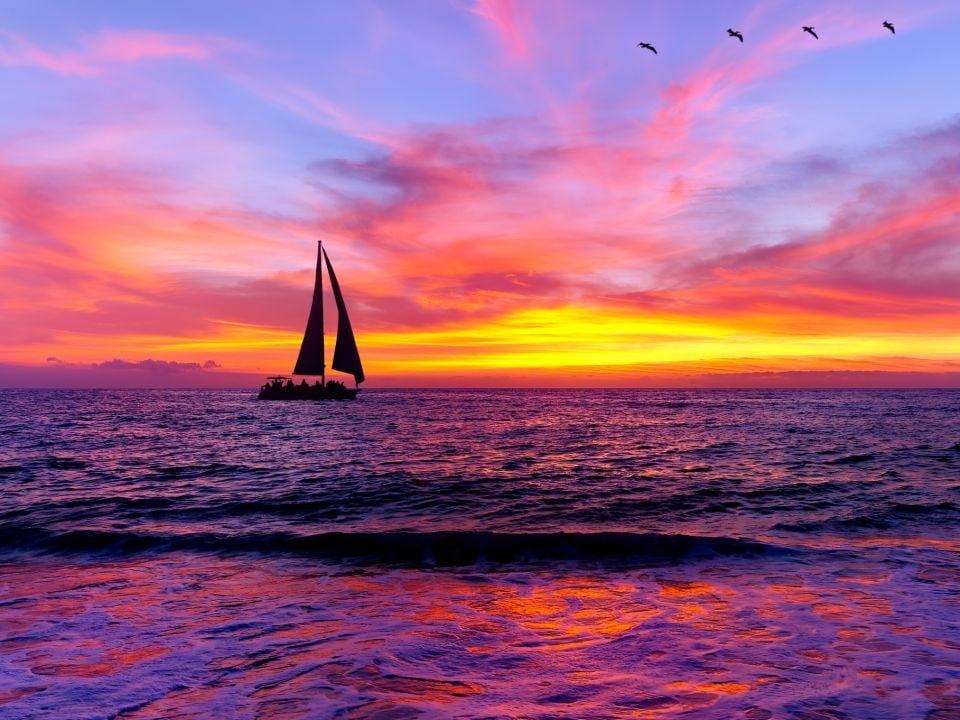 Sailboat on the water at sunset