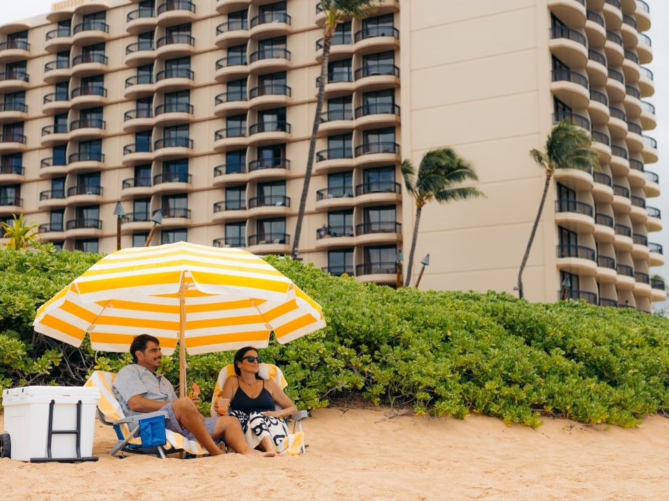 Couple Sitting on Beach