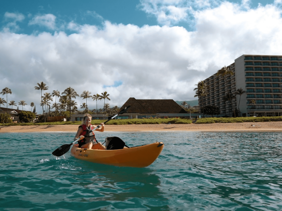 A woman rowing on the sea