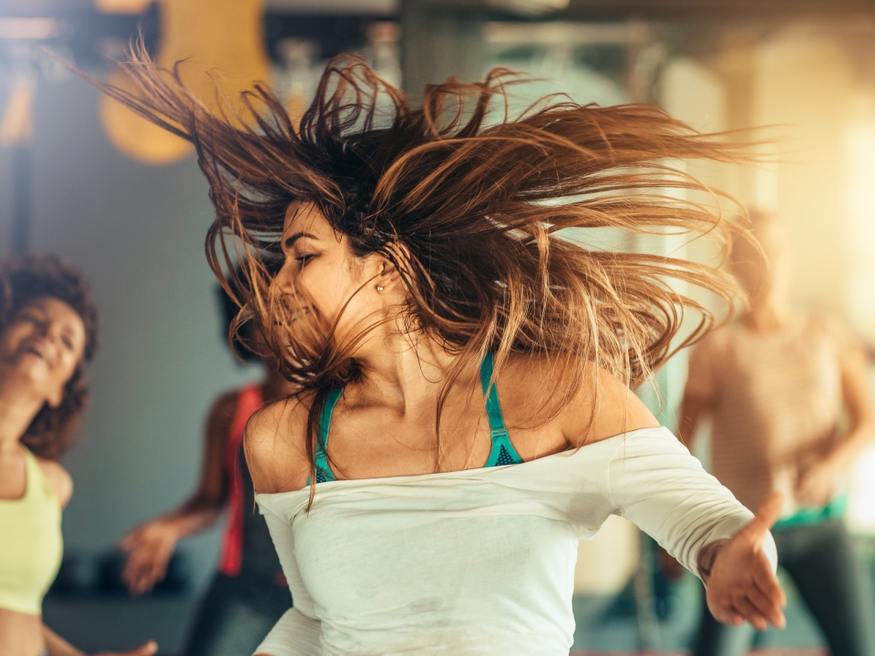female instructor teaching dance fitness