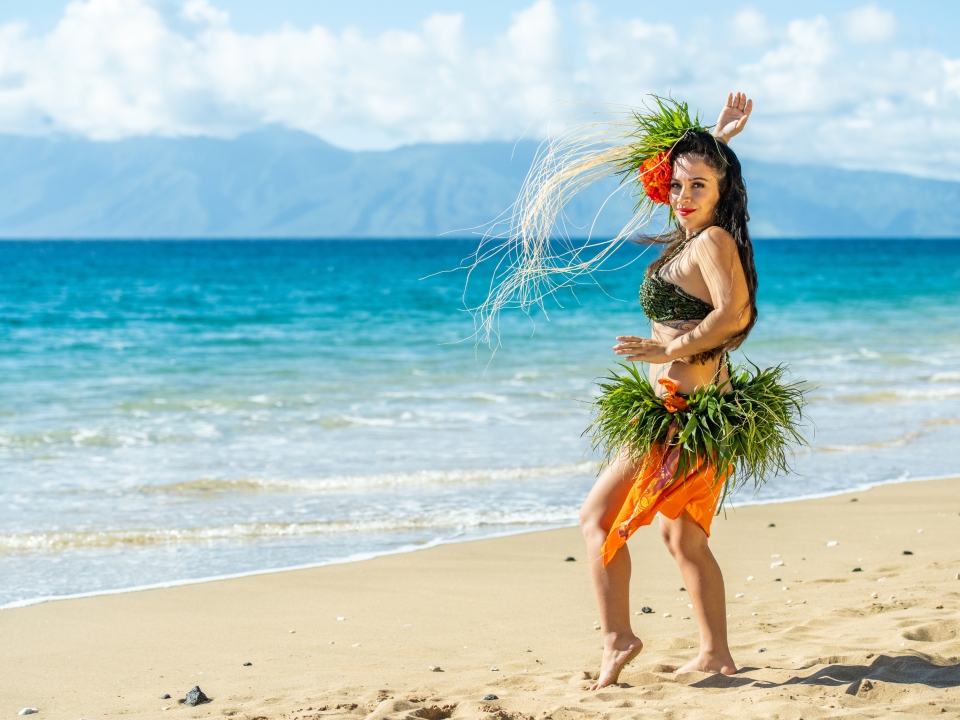 A woman dancing on the beach