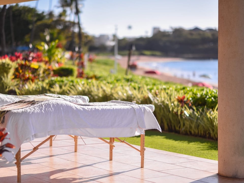 Spa table outdoors overlooking ocean