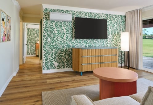 Royal Bungalow Two-Bedroom Suite living room with garden facing balcony