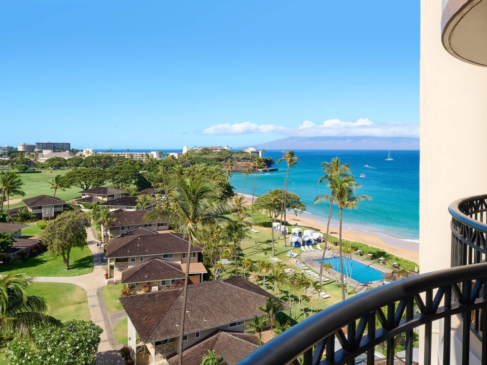 Ocean view from balcony tops of bungalows visible